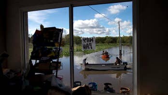 Argentina floods swamp soy crop; some must commute by boat