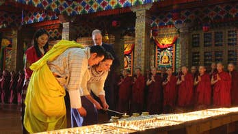 British royal couple trek to Bhutan's cliff-side monastery