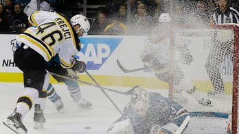 Marchand's OT goal helps Bruins beat Sharks 2-1