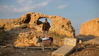 Palestinian President hopes Paris summit ends settlements