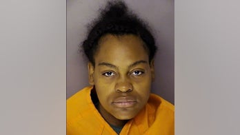 Mom charged with drowning infant; family says she loved boy