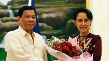 Contrast in style as Duterte meets Myanmar's Suu Kyi