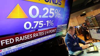 Japan's central bank holds steady on interest rate, stimulus