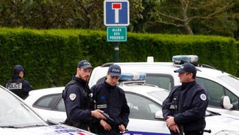 Hollande convenes emergency meeting after 2 police killed