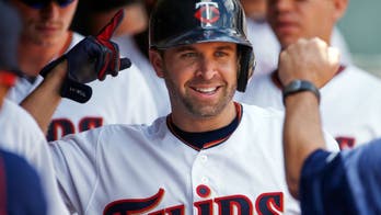 Twins' Dozier happy to remain in Minnesota