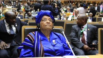 Liberia president sacks 10 officials told to return to fight Ebola