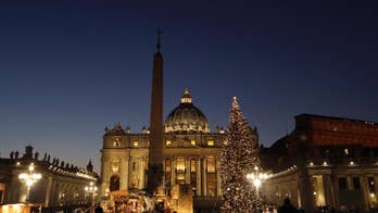 Vatican nativity scene includes quake-damaged church spire