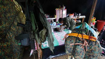 Colombian rebels exchange rifles for rattles amid baby boom