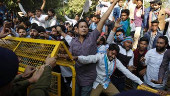 Thousands protest across India against currency policy