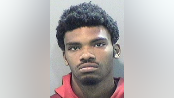 Detroit man charged with robbing wounded officer