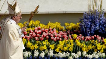 Faithful flock to Vatican as pope celebrates Easter Sunday