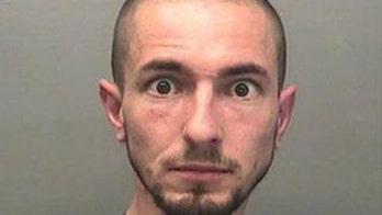 Vain fugitive turns himself in after spotting ‘unflattering’ mugshot on Facebook