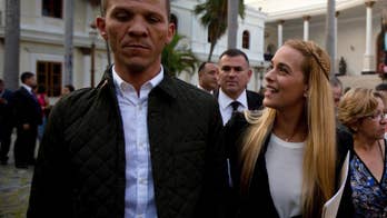 Venezuela arrests opposition lawmaker on weapons charges