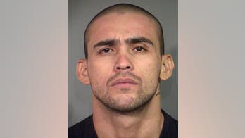 Police video shows Nevada murder suspect break cuffs, escape