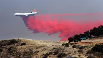 The Latest: Wildfires burn across the Western US