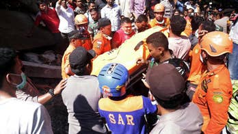 The Latest: Survivor says quake terrifying, fled to hill