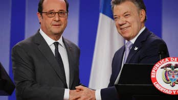French president meets with leftist rebels in Colombia