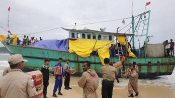 Indonesian province prepares to tow migrant boat out to sea