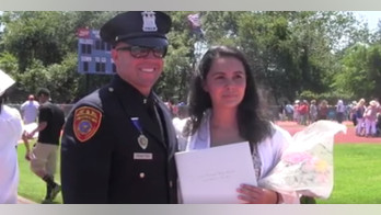 New York cop who saved girl's life attends her graduation six years later