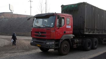 China's poorest, trying to stay warm, add greatly to smog