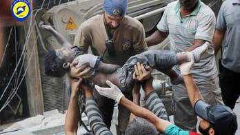 The Latest: Syrian military video shows Aleppo destruction