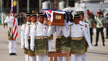 After decades, 32 Australians' remains return from Malaysia