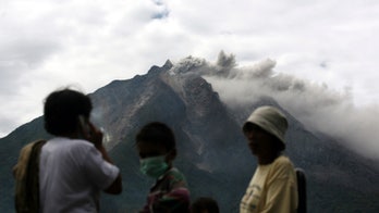 Nearly 6,000 villagers flee after volcano erupts in Indonesia