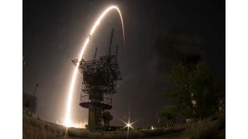 Russian Soyuz spacecraft docks at International Space Station
