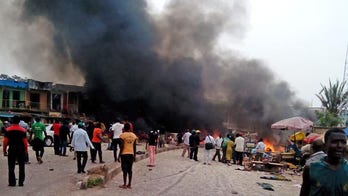 Rescuers to search for bodies in buildings collapsed in twin car bombs blast in Nigerian city