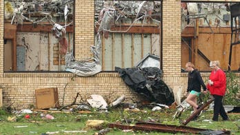 Arkansas couple died trying to protect daughter from twister that hit family's mobile home