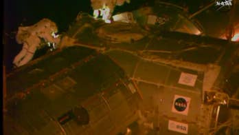Astronauts take 2nd spacewalk in 5 days for cable, lube work outside the space station