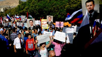 Russian embassy in Syria shelled during pro-government rally