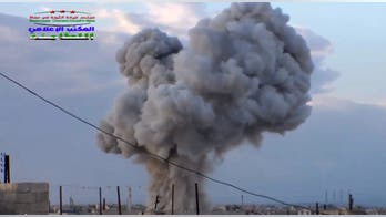 Russians shelling US-backed rebels in Syria, official says