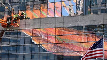 Giant aerial sculpture is installed between high-rises in Boston's Financial District