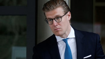 Lawyer linked to Trump campaign who pleaded guilty in Russia probe released from prison, turned over to ICE