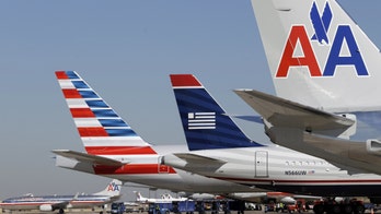 American, US Airways name post-merger leadership