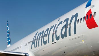 AA plans to put extra-legroom seats on US Airways