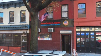 American flag painter offers to paint wall of American Legion building with flag bench