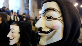 Grand jury indicts 13 members of Anonymous