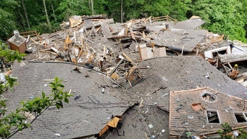 North Carolina floods trigger house collapse; two people missing