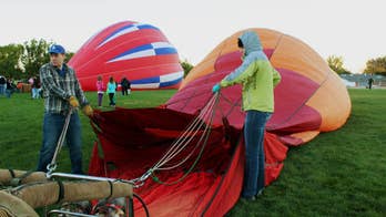 Hundreds of balloon pilots take off at annual New Mexico fiesta