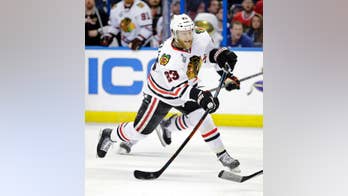 Carolina Hurricanes get F Kris Versteeg in trade with Stanley Cup champion Blackhawks