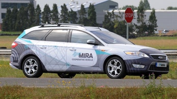 Britain to test driverless cars next year