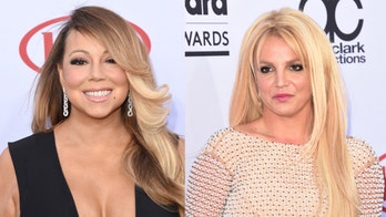 Britney Spears says she likes painting topless with Mariah Carey's music on