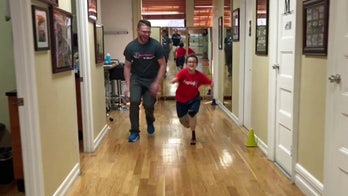 Prosthetics help 9-year-old quadruple amputee run for the first time