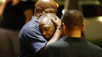 The latest on Charleston shooting: Police say 9 killed at black church in possible hate crime
