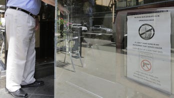 Chicago bans guns in restaurants that sell liquor, expects lawsuits