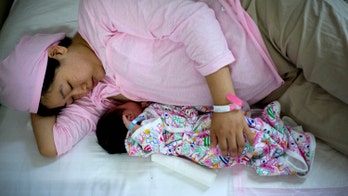 Co-sleeping linked to breastfeeding, study finds