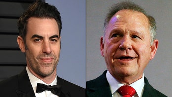 Sacha Baron Cohen seeks to dismiss Roy Moore defamation suit
