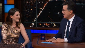 Anne Hathaway, Stephen Colbert poke fun at actress' cheesy first-ever commercial